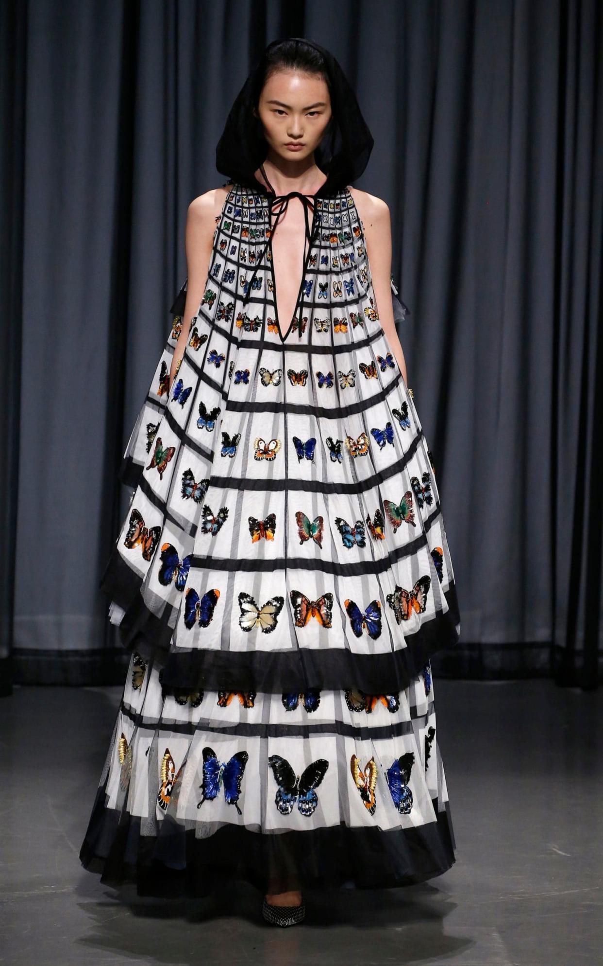 A model wears a gown inspired by butterfly collection - WireImage