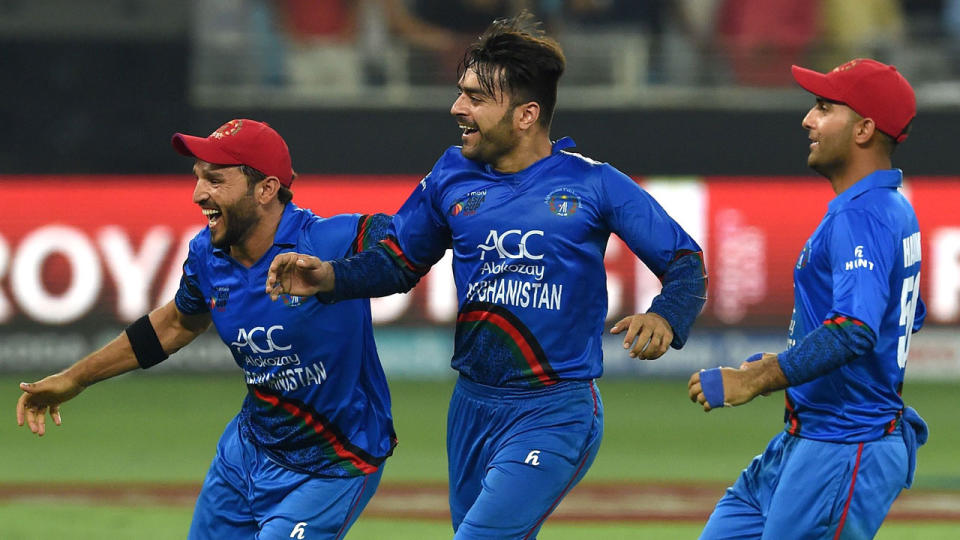 Rashid Khan (C) took the wicket that secured the tie. Pic: Getty