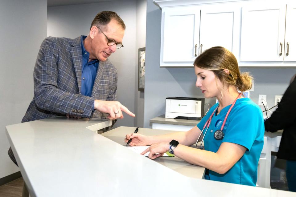Dr. Kyle Rickner and nurse Emily Stroup are pictured at the Primary Health Partners Edmond clinic