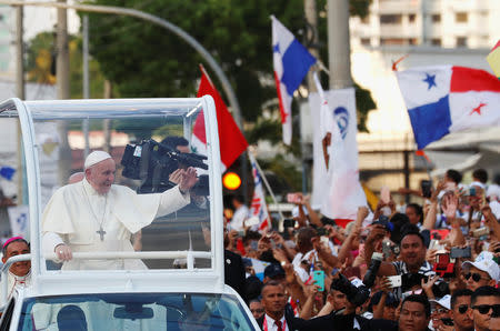 Pope Francis waves from his Popemobile as he arrives for World Youth Day in Panama City, Panama January 23, 2019. REUTERS/Henry Romero