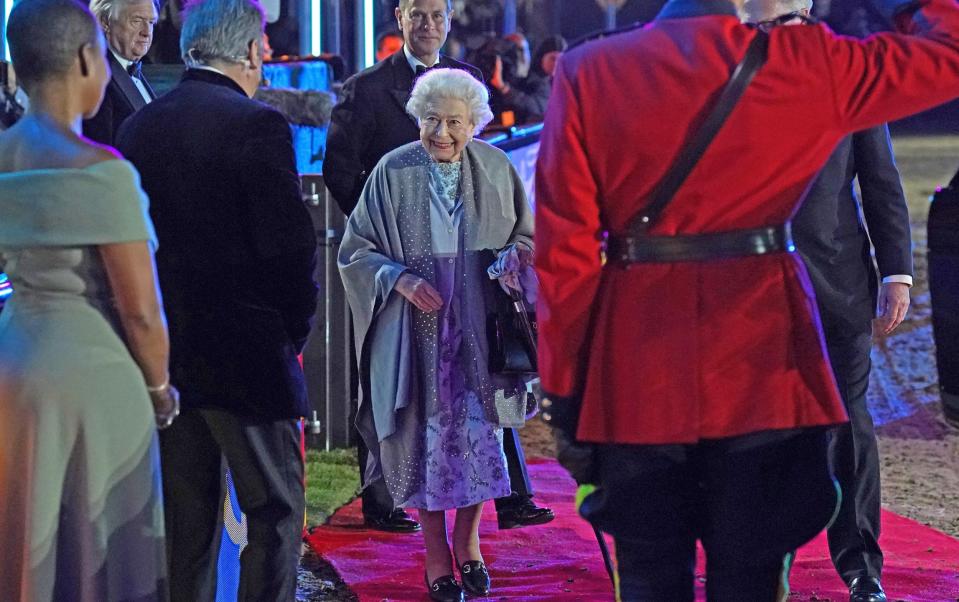 The Queen takes to the red carpet with a smile for those involved in the event - Steve Parsons