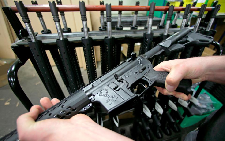 Craftsman Veetek Witkowski holding a newly assembled AR-15 rifle at the Stag Arms company in New Britain, Conn., in 2013 A ruling released on April 6, 2018, by a federal judge in Boston, dismissed a lawsuit challenging Massachusetts' ban on assault weapons and large-capacity magazines, stating that assault weapons are beyond the scope of the Second Amendment right to "bear arms."