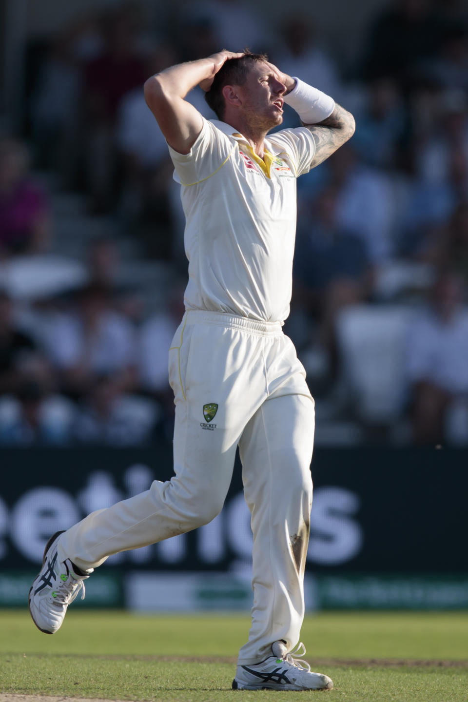 Australia's James Pattinson reacts after a missed opportunity against England's Joe Root on the third day of the 3rd Ashes Test cricket match between England and Australia at Headingley cricket ground in Leeds, England, Saturday, Aug. 24, 2019. (AP Photo/Jon Super)