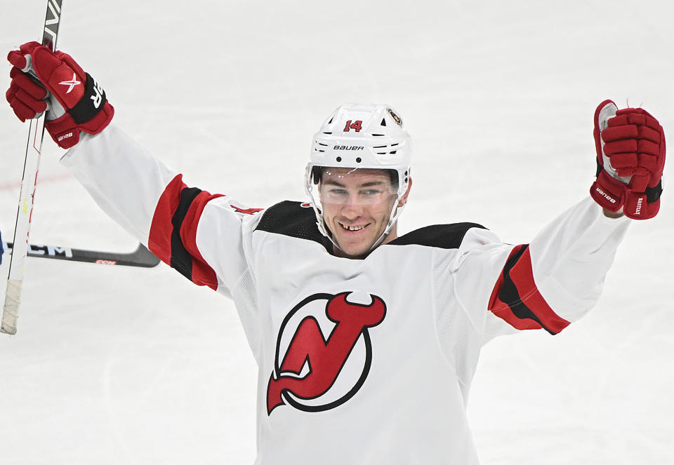 New Jersey Devils' Nathan Bastian celebrates his goal against the Montreal Canadiens during the first period of an NHL hockey game Saturday, March 11, 2023, in Montreal. (Graham Hughes/The Canadian Press via AP)