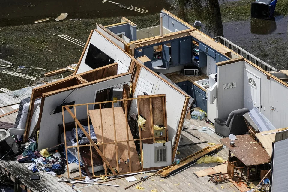 Image: The remains of a destroyed home built atop a platform on piles are seen in Keaton Beach, Fla., during a flight provided by mediccorps.org, following the passage of Hurricane Idalia, on  Aug. 30, 2023. (Rebecca Blackwell / AP)