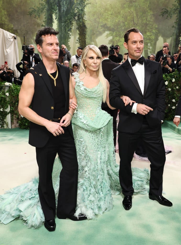 Andrew Scott, Donatella Versace and Jude Law attend The 2024 Met Gala Celebrating "Sleeping Beauties: Reawakening Fashion" at The Metropolitan Museum of Art on May 06, 2024 in New York City.