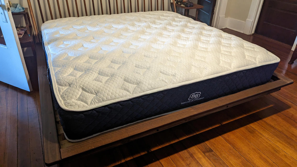  The Brooklyn Bedding Signature Hybrid with Cloud Pillow Top mattress on a bed 