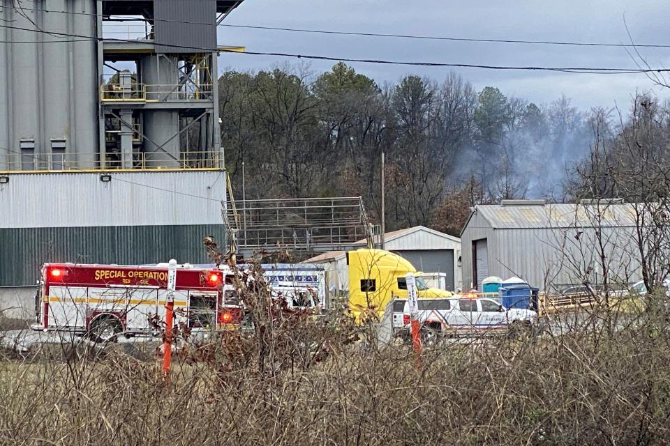 Emergency personnel respond to the scene after a small aircraft crashed while taking off from the Bill and Hillary Clinton National Airport in Little Rock, Ark., Wednesday Feb. 22, 2023.