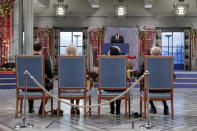 Ethiopia's Prime Minister Abiy Ahmed makes a speech toward the Norwegian royal family during the Nobel Peace Prize award ceremony in Oslo City Hall, Norway, Tuesday Dec. 10, 2019. (Stian Lysberg Solum/NTB Scanpix via AP)