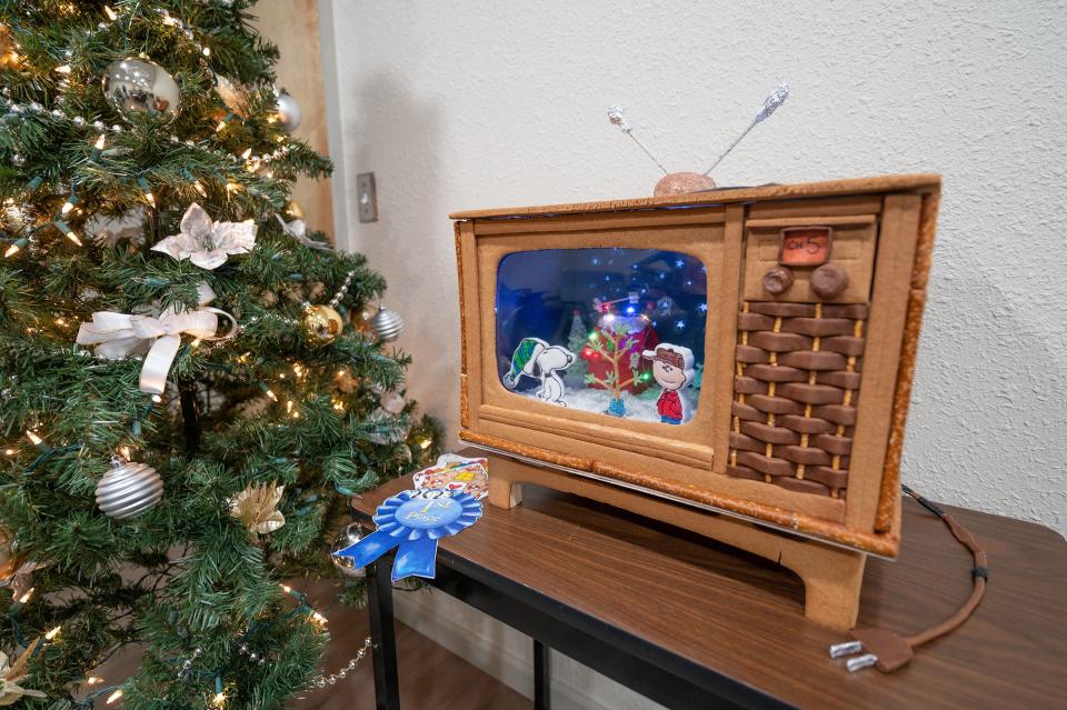 Pueblo Parks and Recreation won the city's inter-departmental gingerbread house contest with their Charlie Brown television creation.