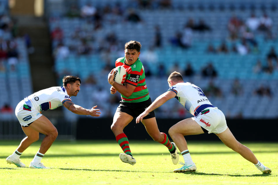 SYDNEY, AUSTRALIA - APRIL 06: Latrell Mitchell of the Rabbitohs is tackled during the round five NRL match between South Sydney Rabbitohs and New Zealand Warriors at Accor Stadium, on April 06, 2024, in Sydney, Australia. (Photo by Mark Metcalfe/Getty Images)