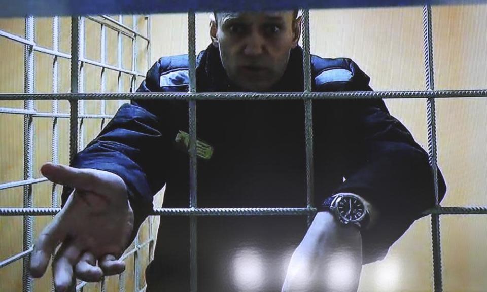 The Russian opposition leader Alexei Navalny speaks via a video link from prison