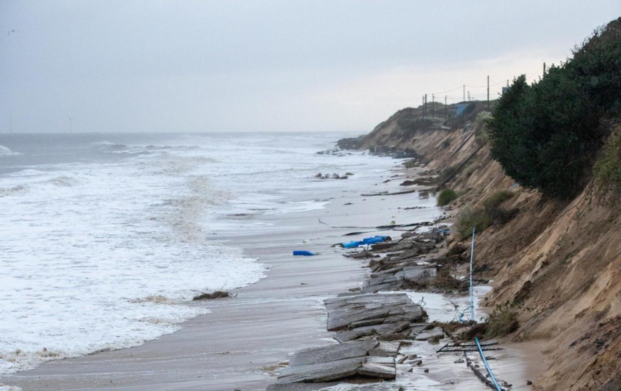 Coastal erosion caused by high tides and wind led to the Marrams in Hemsby, Norfolk, collapsing into the road