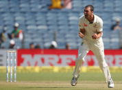 Cricket - India v Australia - First Test cricket match - Maharashtra Cricket Association Stadium, Pune, India - 24/02/17. Australia's Mitchell Starc celebrates the wicket of India's captain Virat Kohli. REUTERS/Danish Siddiqui