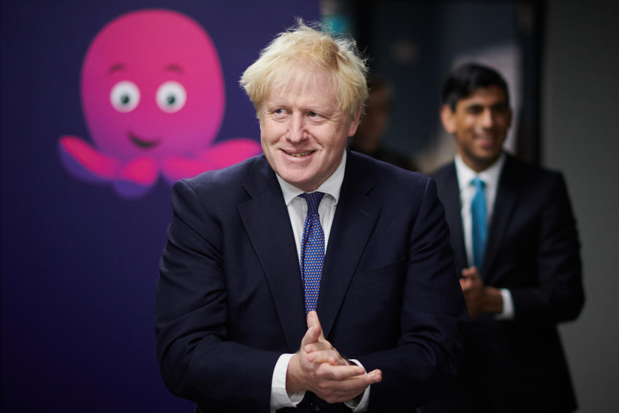 Prime Minister Boris Johnson and Chancellor of the Exchequer Rishi Sunak during a visit to the headquarters of Octopus Energy in London.