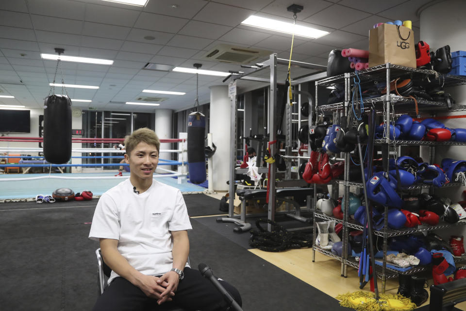 Japanese boxer and the WBA and IBF bantamweight world champion Naoya Inoue speaks during an interview with The Associated Press in Yokohama, near Tokyo on Nov. 23, 2021. Drawing praise as one of the best "pound for pound" active boxers around, and the best out of Asia since the legendary Manny Pacquiao, Inoue now has his eyes on the big money and American stardom. (AP Photo/Koji Sasahara)