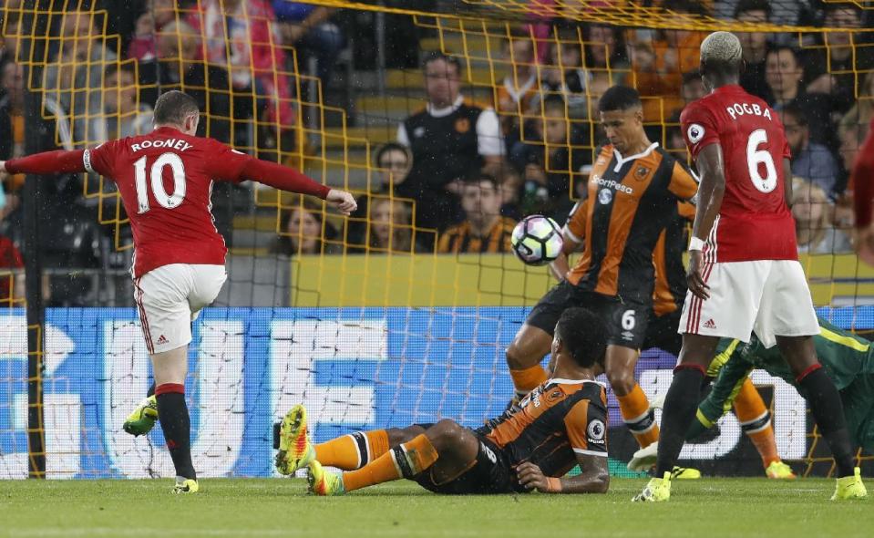 Football Soccer Britain- Hull City v Manchester United - Premier League - The Kingston Communications Stadium - 27/8/16 Manchester United's Wayne Rooney shoots at goal Action Images via Reuters / Lee Smith Livepic EDITORIAL USE ONLY. No use with unauthorized audio, video, data, fixture lists, club/league logos or "live" services. Online in-match use limited to 45 images, no video emulation. No use in betting, games or single club/league/player publications. Please contact your account representative for further details.