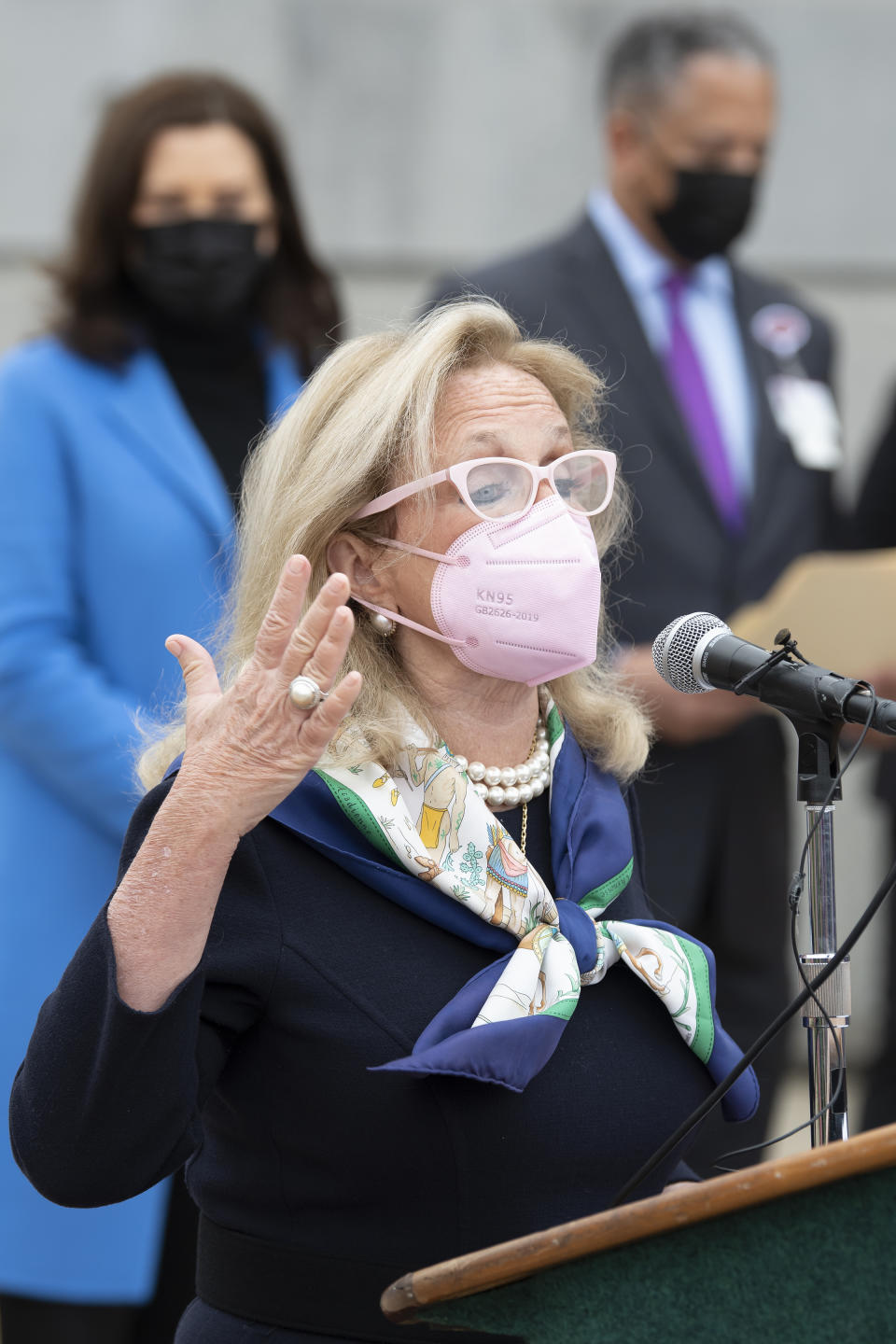 U.S. Representative Debbie Dingell speaks about the COVID-19 vaccination effort during a press conference outside the Eastern Michigan University Convocation Center, which was hosting a vaccination clinic, Monday, April 12, 2021, in Ypsilanti, Mich. (Lon Horwedel/Detroit News via AP)