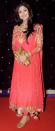 Shilpa’s wearing a gorgeous tomato red crushed anarkali with jootis. Love the look. Wear this to a mehendi function.