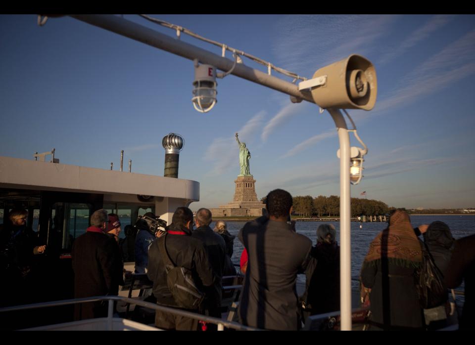 NEW YORK - OCTOBER 28:  The Statue of Liberty is seen from a ferry carrying passengers for a naturalization ceremony at Liberty Island on October 28, 2011 in New York City.  One hundred and twenty five citizens were naturalized in honor of the Statue of Liberty's 125th birthday.  (Photo by Michael Nagle/Getty Images)