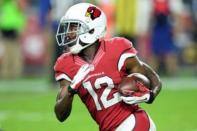 Arizona Cardinals wide receiver John Brown (12) runs after making a catch against the Cincinnati Bengals during the second half at University of Phoenix Stadium. The Cardinals won 34-31. Mandatory Credit: Joe Camporeale-USA TODAY Sports