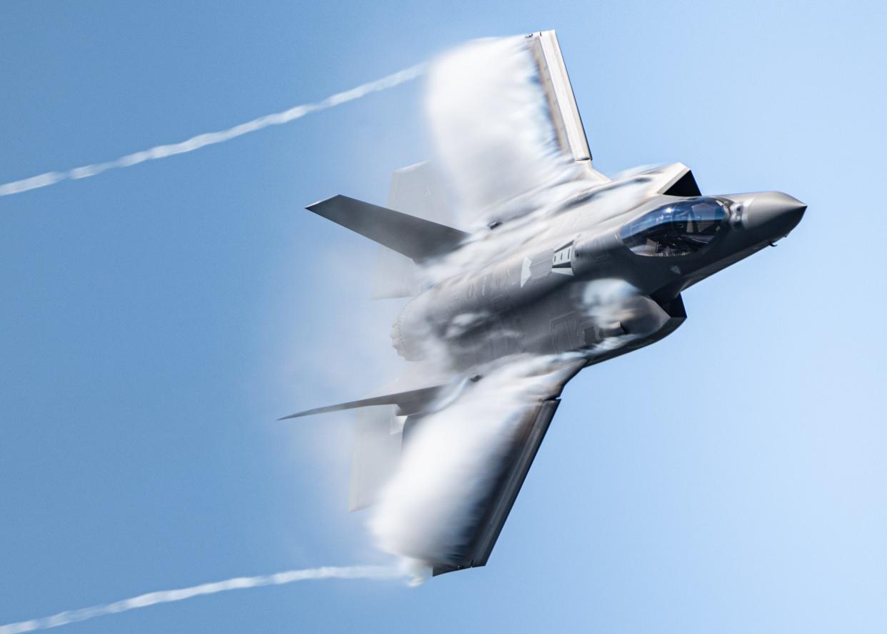 An F-35A Lightning II flown by Maj. Kristin Wolfe, 388th Fighter Wing F-35A Demonstration Team commander, performs a dedication pass during an airshow over Kleine Brogel Air Base, Belgium, Sept. 8, 2023.