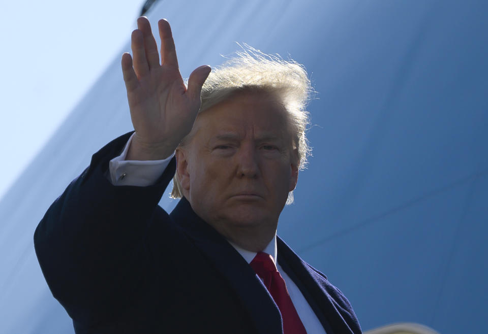 US President Donald Trump waves as he arrives to board Air Force One as he departs at John F. Kennedy international airport, after attending an MMA match the night before in New York City on November 3, 2019. (Photo by Andrew CABALLERO-REYNOLDS / AFP) (Photo by ANDREW CABALLERO-REYNOLDS/AFP via Getty Images)