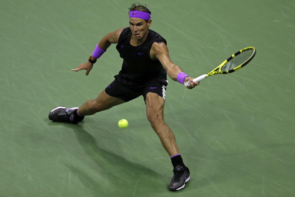 Rafael Nadal, of Spain, hits a return to Diego Schwartzman, of Argentina, during the quarterfinals of the U.S. Open tennis tournament Wednesday, Sept. 4, 2019, in New York. (AP Photo/Adam Hunger)