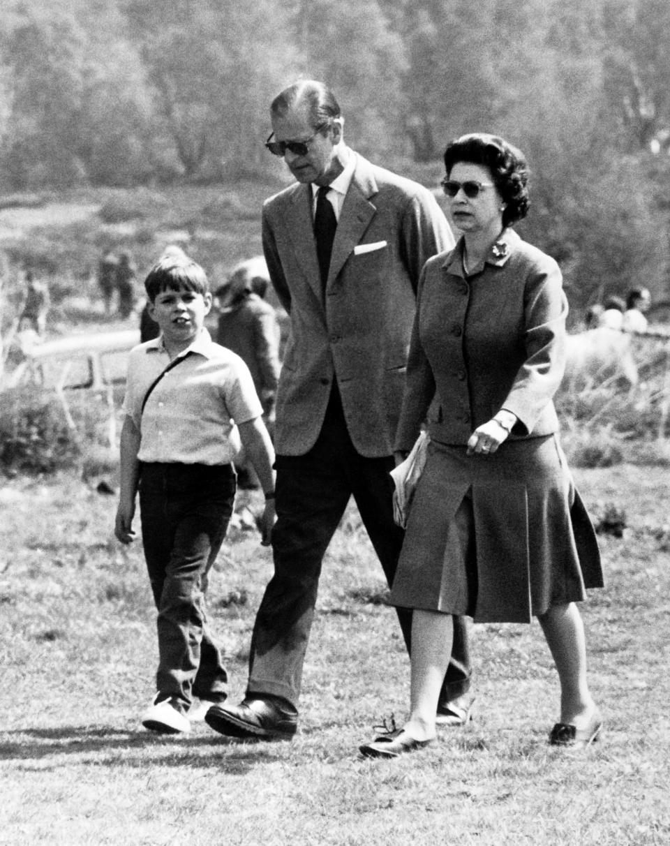 Prince Andrew with parents Queen Elizabeth II and Prince Philip in 1968, aged eight. (Getty Images)