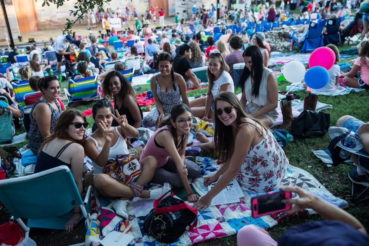 The Zilker Summer Musical is a decades-long tradition in Austin. Audiences fill the hillside with blankets hours in advance, before the show starts around dusk.