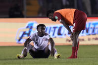 Panama's Freddy Gondola, right, talks with United States´ George Bello at the end of a qualifying soccer match for the FIFA World Cup Qatar 2022 at Rommel Fernandez stadium, in Panama city, Panama, Sunday, Oct. 10, 2021. Panama won 1-0. (AP Photo/Arnulfo Franco)