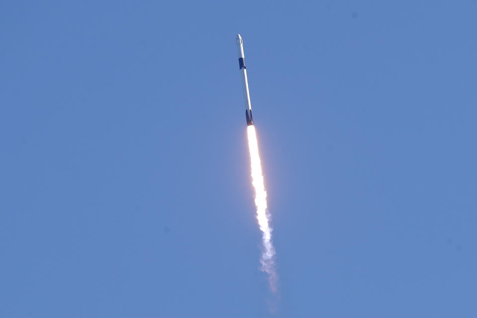 A Falcon 9 SpaceX rocket on a resupply mission to the International Space Station soars skyward after lift off from Space Launch Complex 40 at Cape Canaveral Air Force Station in Cape Canaveral, Fla., Thursday, Dec. 5, 2019. (AP Photo/John Raoux)