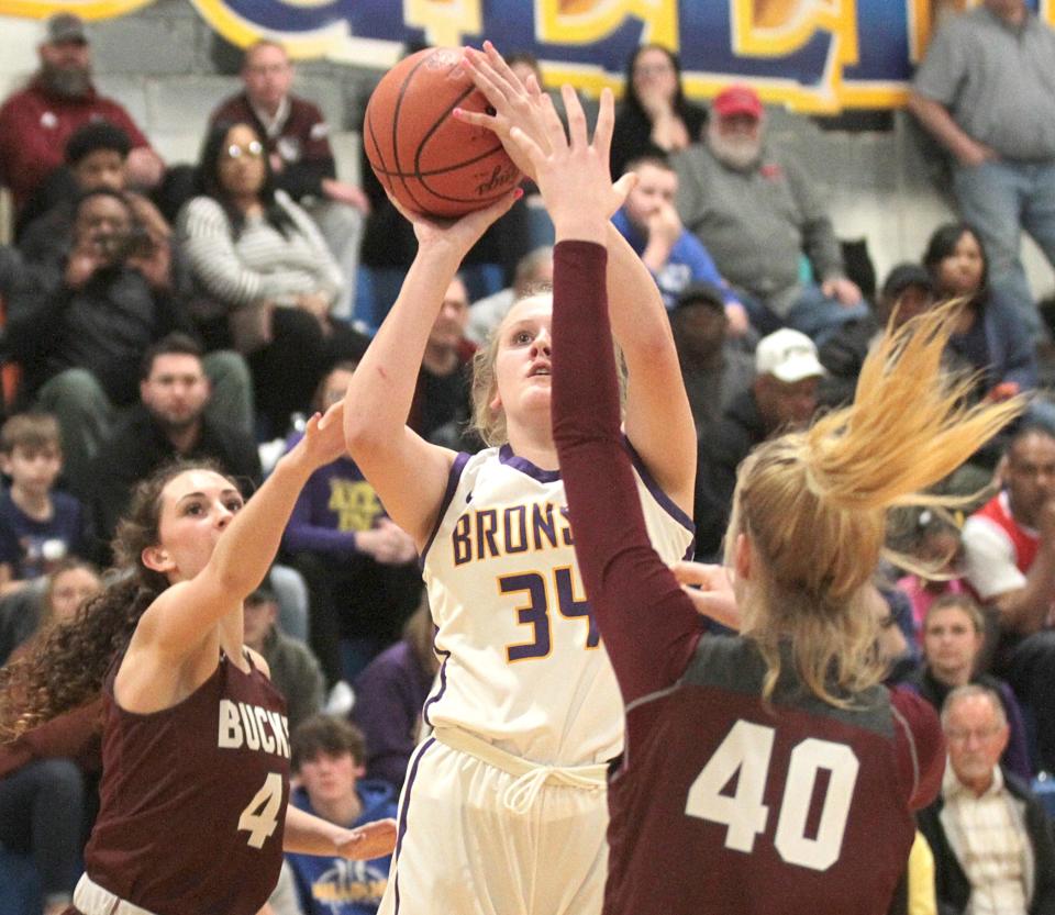 Payton Springstead rises up to score two points against Buchanan in the regional semifinals on Tuesday.