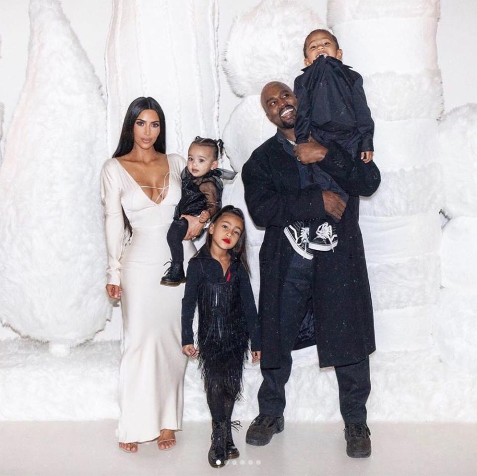 Kim Kardashian and Kanye West with their children Chicago, Saint and North