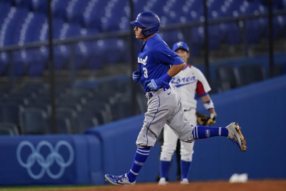 Israel's Ian Kinsler rounds the basses after hitting a home run in the third inning of a baseball game against South Korea at the 2020 Summer Olympics, Thursday, July 29, 2021, in Yokohama, Japan. (AP Photo/Sue Ogrocki)