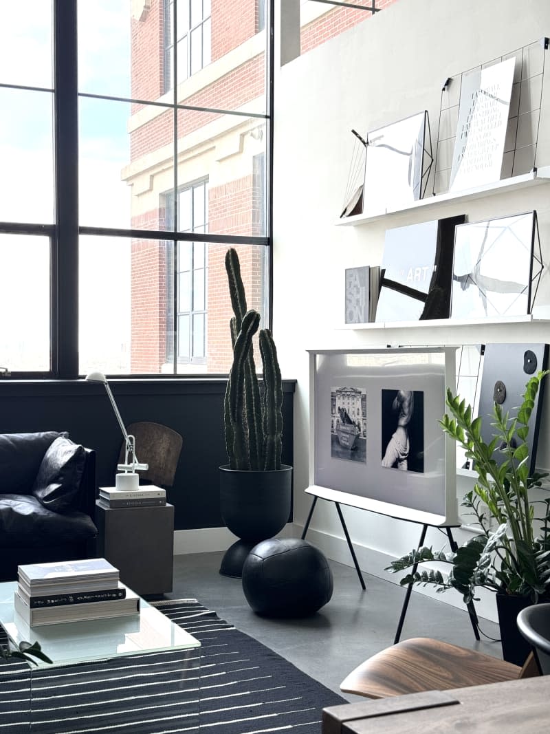 White and black furniture and art on shelving