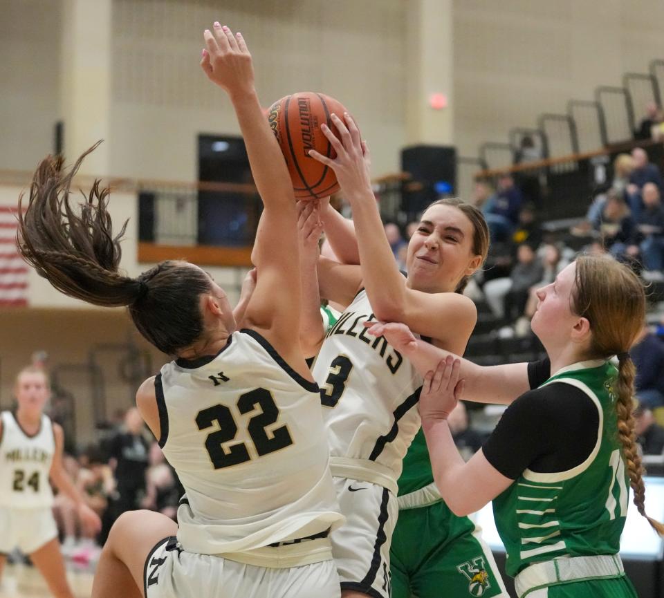 Noblesville High School's Ally Hutchinson (3) works under pressure from Valparaiso High School players at Noblesville High School, Dec 28, 2023. Noblesville won 65-56.