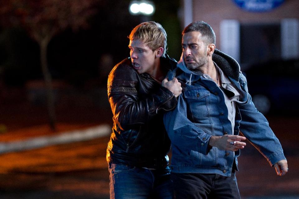 This film image released by LD Entertainment shows Max Thieriot, left, and Marc Jacobs in a scene from "Disconnect." (AP Photo/LD Entertainment)