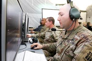 Service members using the Integrated Battle Command System (IBCS) at Redstone Arsenal, Huntsville, Alabama. (Photo Credit: U.S. Army)