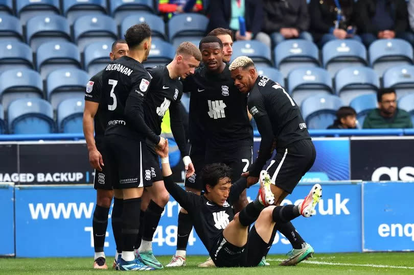 Birmingham City players celebrate after Koji Miyoshi scored against Huddersfield