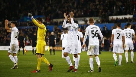 Football Soccer Britain - Swansea City v Crystal Palace - Premier League - Liberty Stadium - 26/11/16 Swansea City's players applaud the fans at the end of the game Action Images via Reuters / Peter Cziborra Livepic