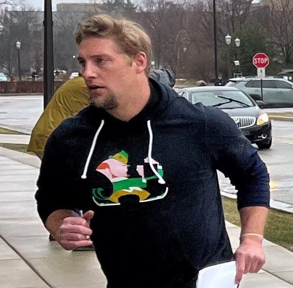 Former Michigan State and NFL linebacker Max Bullough, hired in February as a graduate assistant at Notre Dame after three seasons at Alabama, walks into the indoor practice facility on March 25, 2023 in South Bend, Ind.