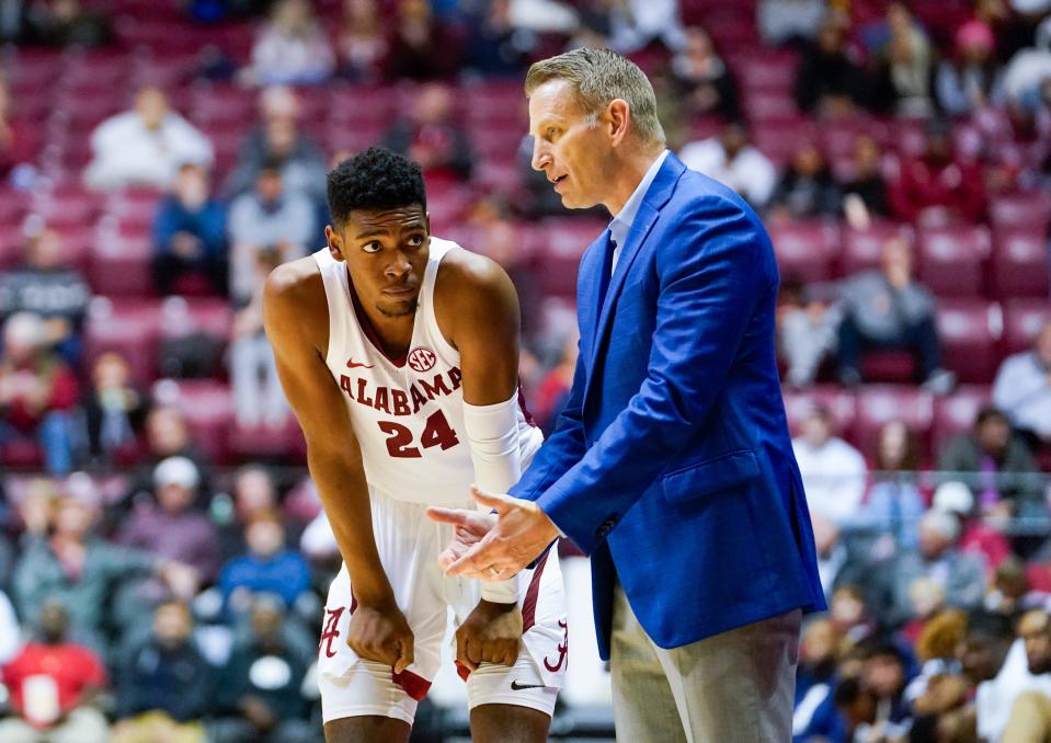 Alabama Crimson Tide head coach Nate Oats talks to Alabama Crimson Tide forward Brandon Miller (24) during the second half against the Jackson State Tigers at Coleman Coliseum.