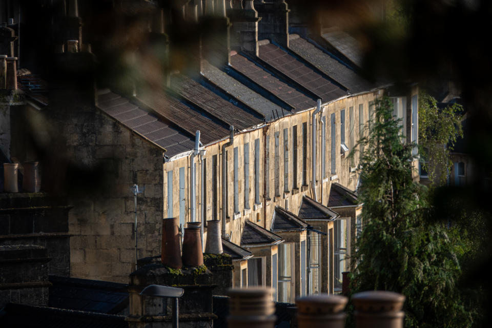 UK house sales BATH, UNITED KINGDOM - SEPTEMBER 17: Early morning sun illuminates streets of residential terraced houses, on September 17, 2023 in Bath, England. Soaring interest rates and falling prices has meant the end of the UK’s 13-year housing market boom potentially leading to a wider house price crash. (Photo by Matt Cardy/Getty Images)
