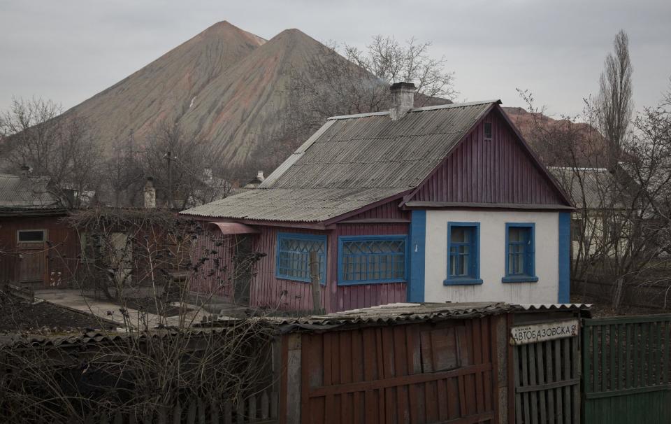In this photo taken Tuesday, Feb. 25, 2014, a typical miner's home is seen near a coal mine in the outskirts of Donetsk, eastern Ukraine. If Ukraine looks neatly delineated on maps, its history is a tangle of invasions and occupations and peoples and religions, a place of ill-defined borders that for centuries has been struggling to define itself. The modern nation is so sharply divided by culture and loyalty, split between allegiance to Moscow and allegiance to Western Europe, that it often can appear ready to simply snap in two. (AP Photo/Darko Bandic)