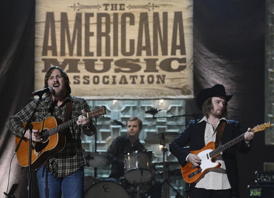 FILE - In this Sept. 17, 2014 file photo, Sturgill Simpson, left, performs during the Americana Music Honors and Awards show in Nashville, Tenn. Top Grammy contenders Simpson and Chance the Rapper are set to perform at the awards show this month. The Recording Academy announced Thursday, Feb. 2, 2017 that fellow nominee William Bell and Grammy winners Little Big Town and Gary Clark Jr. will also perform on the live telecast on Feb. 12. (AP Photo/Mark Zaleski)