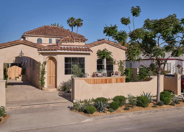 Conveniently located minutes from Downtown Culver City, the Spanish-style home presents multiple private outdoor spaces tucked away behind the stucco wall bordering the property.