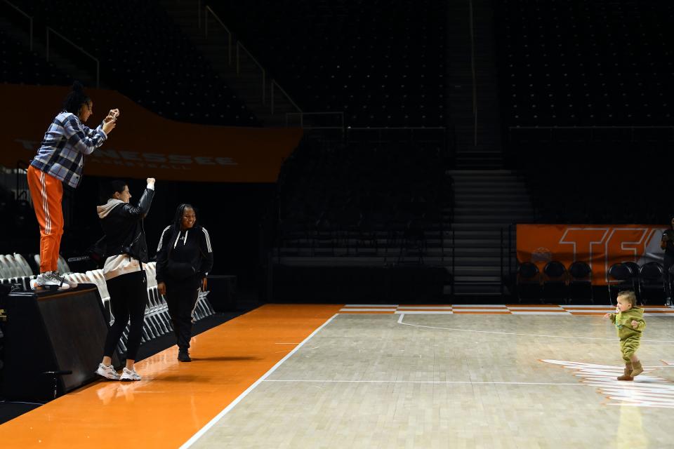 Candace Parker and wife Anna Petrakova photograph their son Airr Larry Petrakov Parker as he walks across The Summitt after the NCAA college basketball game between the Tennessee Lady Vols and Georgia on Sunday, January 15, 2023 in Knoxville, Tenn. 