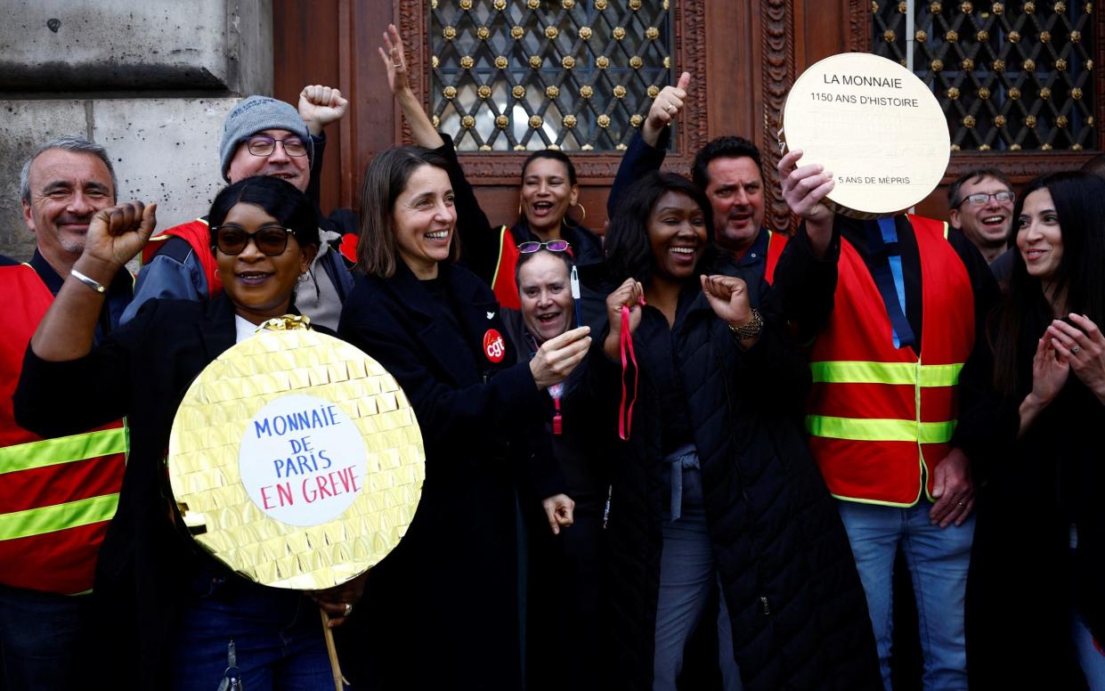 Union leader Sophie Binet, fourth left, said management must start negotiations to ensure the Olympics go smoothly