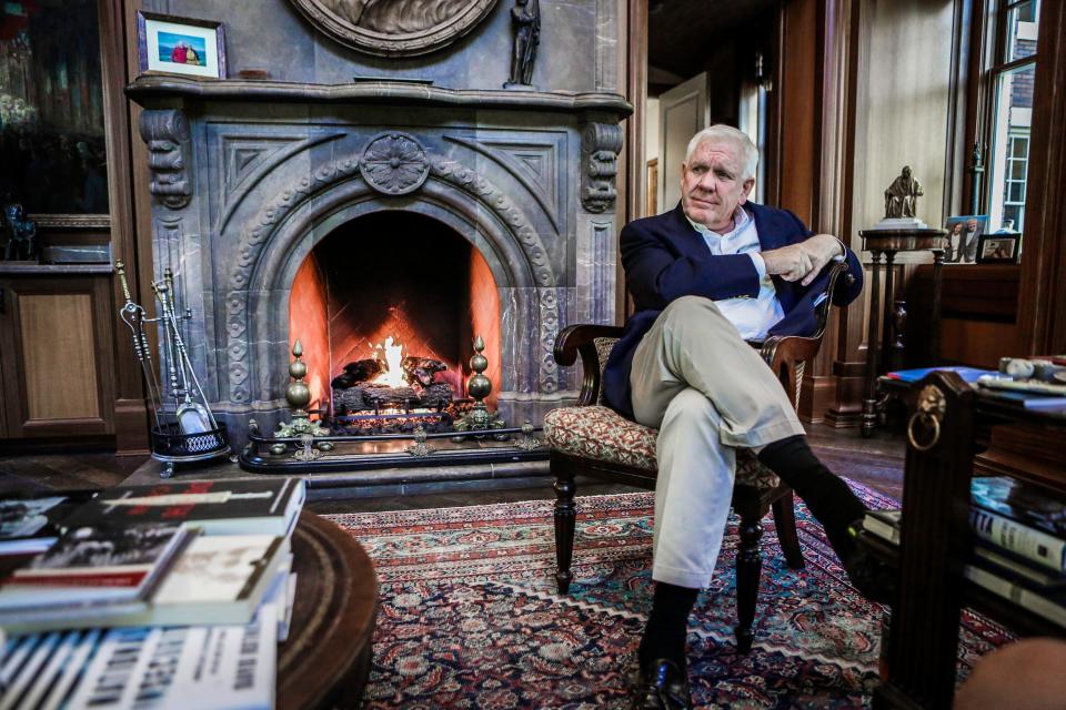 Harlan Crow poses for a photograph in a redeveloped office complex